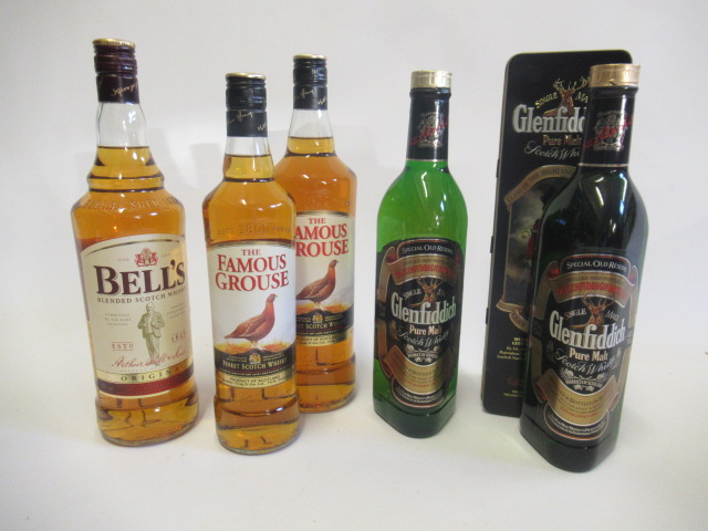 5 bottles of Scotch whisky comprising 1 tinned Glenfiddich pure malt Image