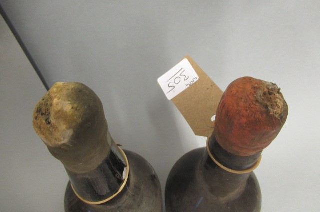 Two bottles of vintage port Image
