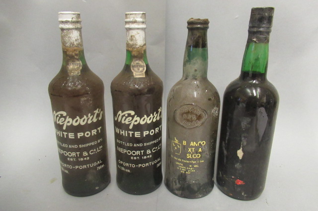 Four bottles of fortified wine Image