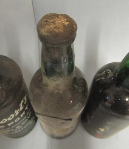 Four bottles of fortified wine Image