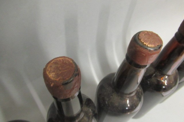 Six bottles believed port Image