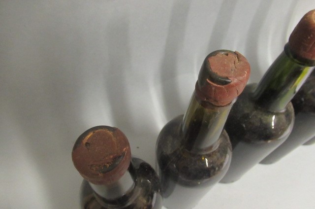 Six bottles believed port Image