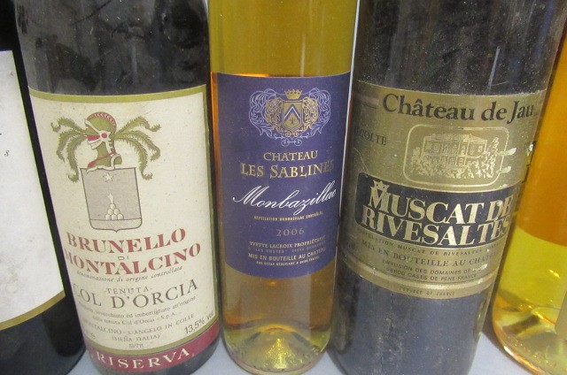 9 bottles of European wine including examples form France Image
