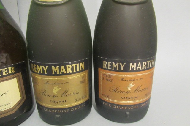 4 bottles of cognac Image
