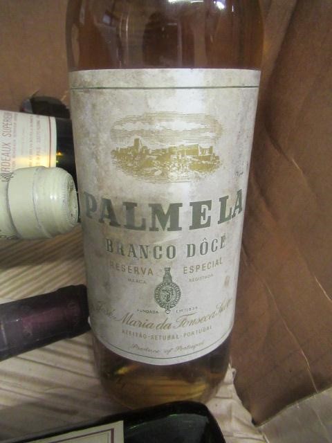 9 bottles of European wine Image