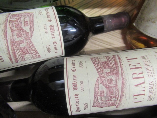 9 bottles of European wine Image