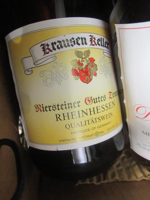 9 bottles of European wine Image