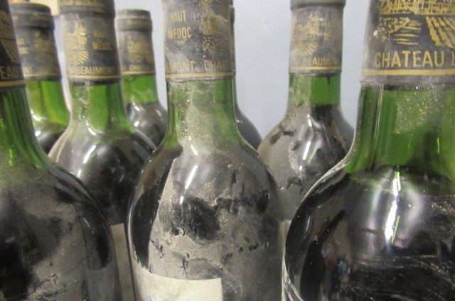 9 bottles Chateau Beaumont Image