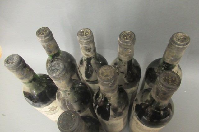 9 bottles Chateau Beaumont Image