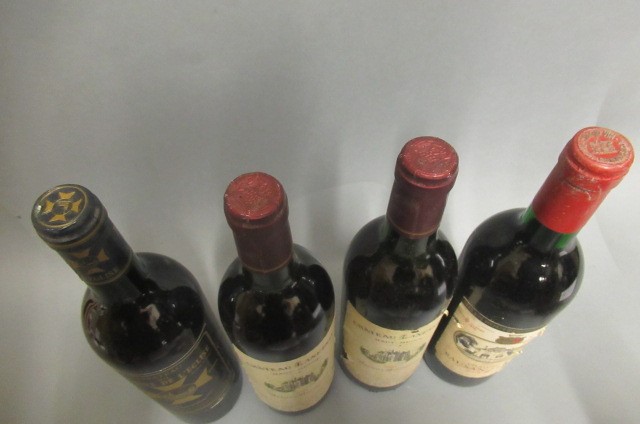 4 bottles of Bordeaux Image