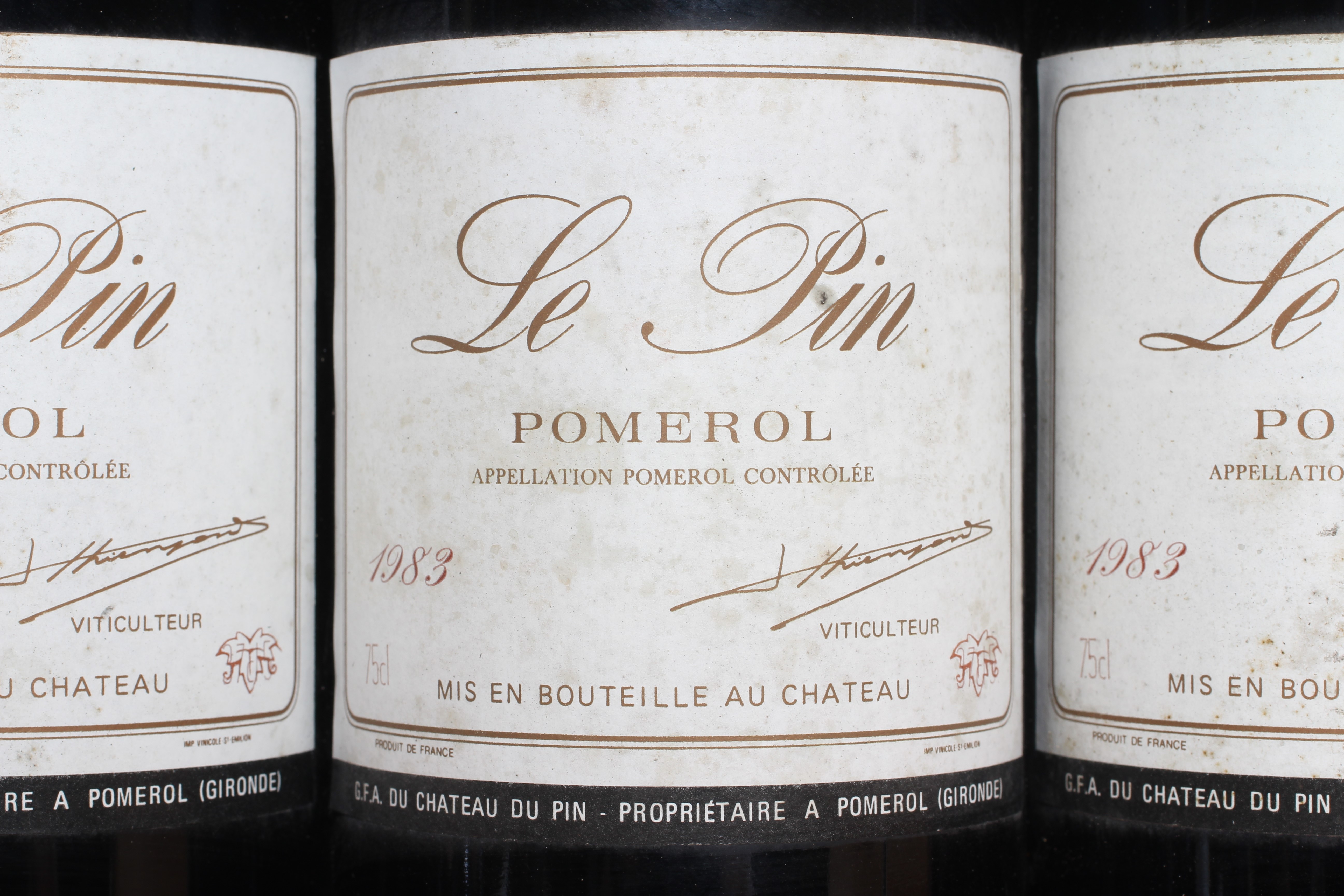 7 bottles Le Pin Image