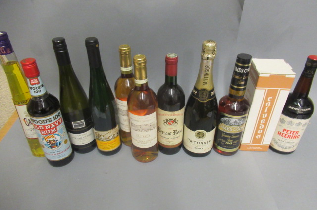 12 bottles of mixed alcohol Image