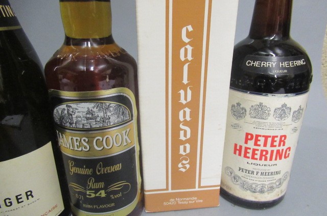 12 bottles of mixed alcohol Image