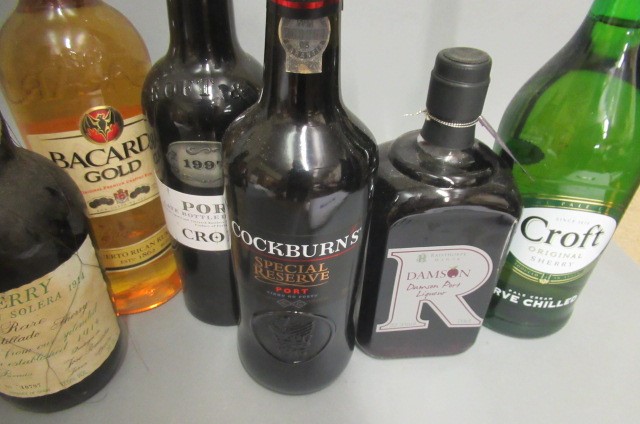 12 bottles of mixed  alcohol Image