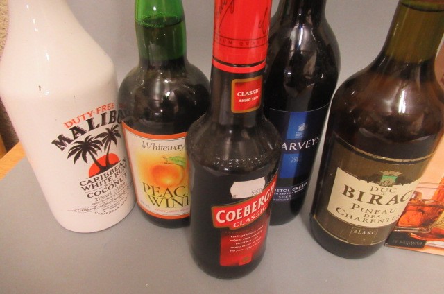 12 bottles of mixed  alcohol Image