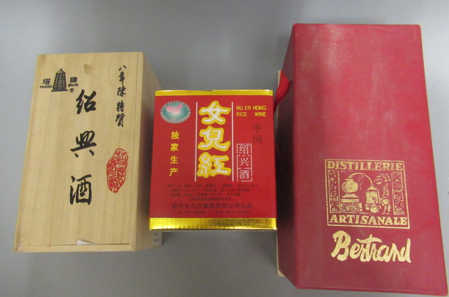 2 ceramic bottles of boxed rice wine (pagoda brand and other) Image