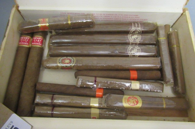 A box of assorted cigars including 2 Henry Clay Image