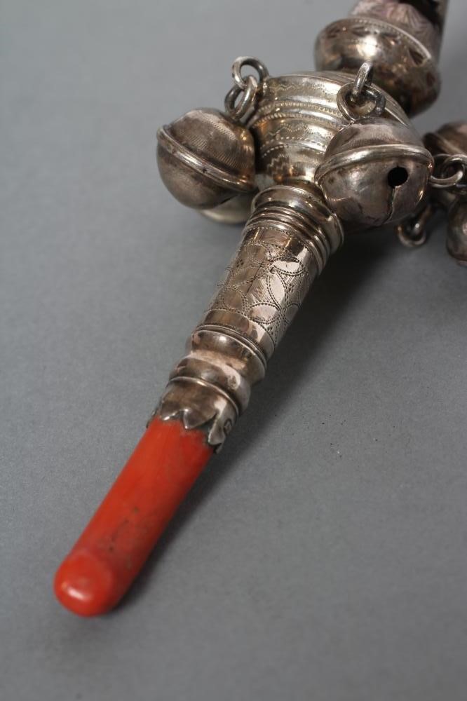 A LATE GEORGE III SILVER RATTLE/WHISTLE Image