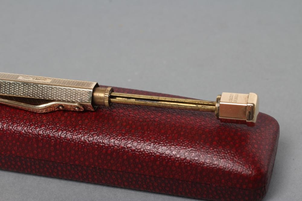 A 9CT GOLD "YARD-O-LED" PROPELLING PENCIL of octagonal form with engine turning enclosing a vacant Image
