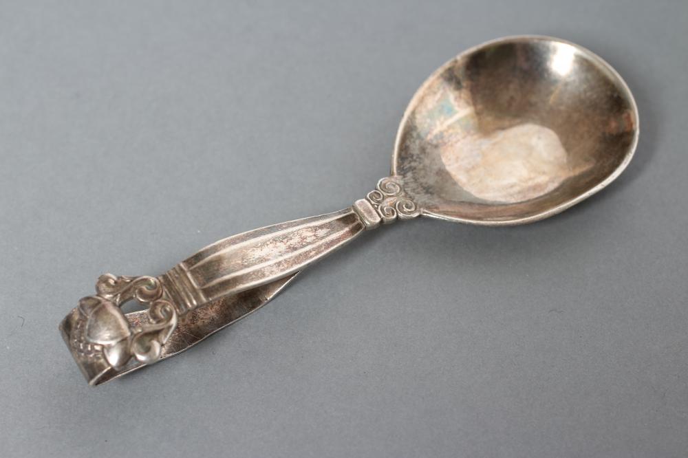 A GEORG JENSEN SILVER CADDY SPOON Image