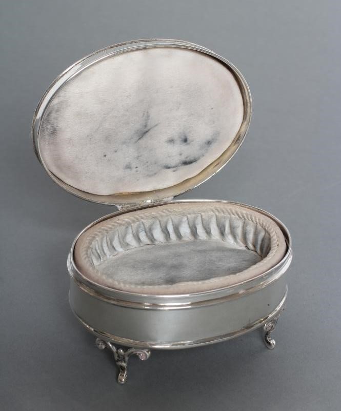 AN OVAL DRESSING TABLE BOX Image
