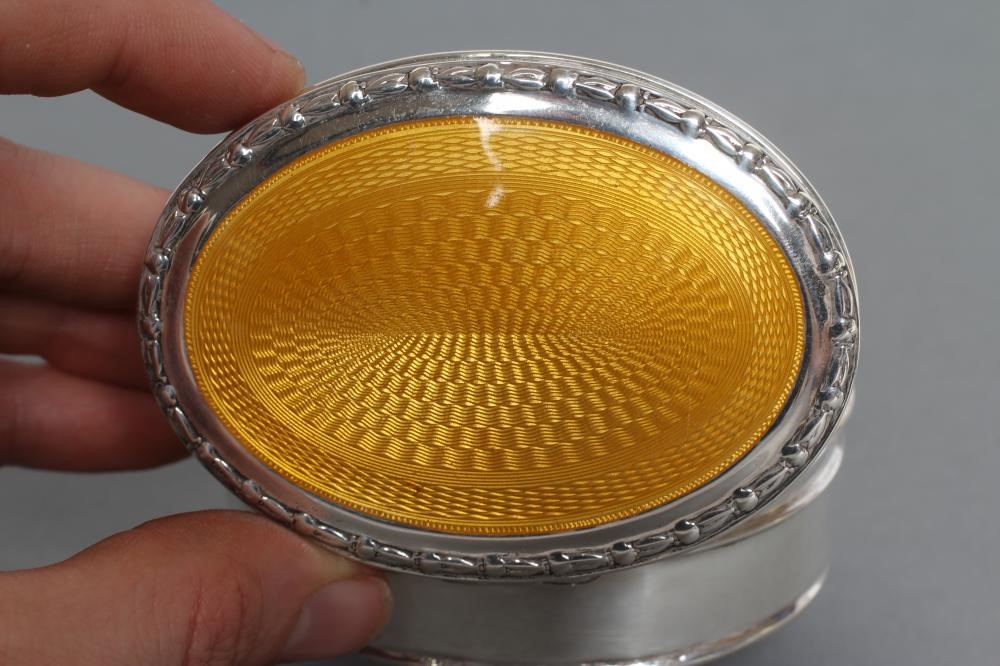 AN OVAL DRESSING TABLE BOX Image