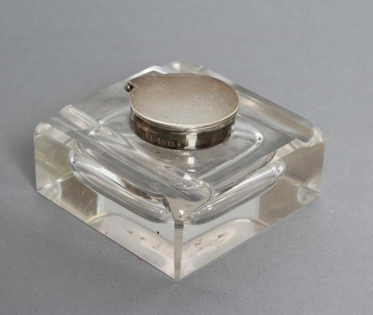 A SILVER MOUNTED INKWELL Image