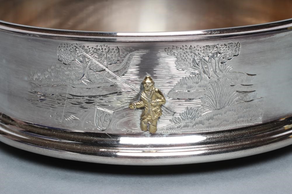 A SILVER BOTTLE COASTER Image