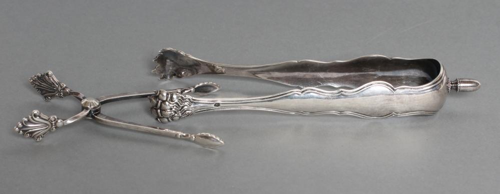 A PAIR OF SILVER SUGAR NIPS Image