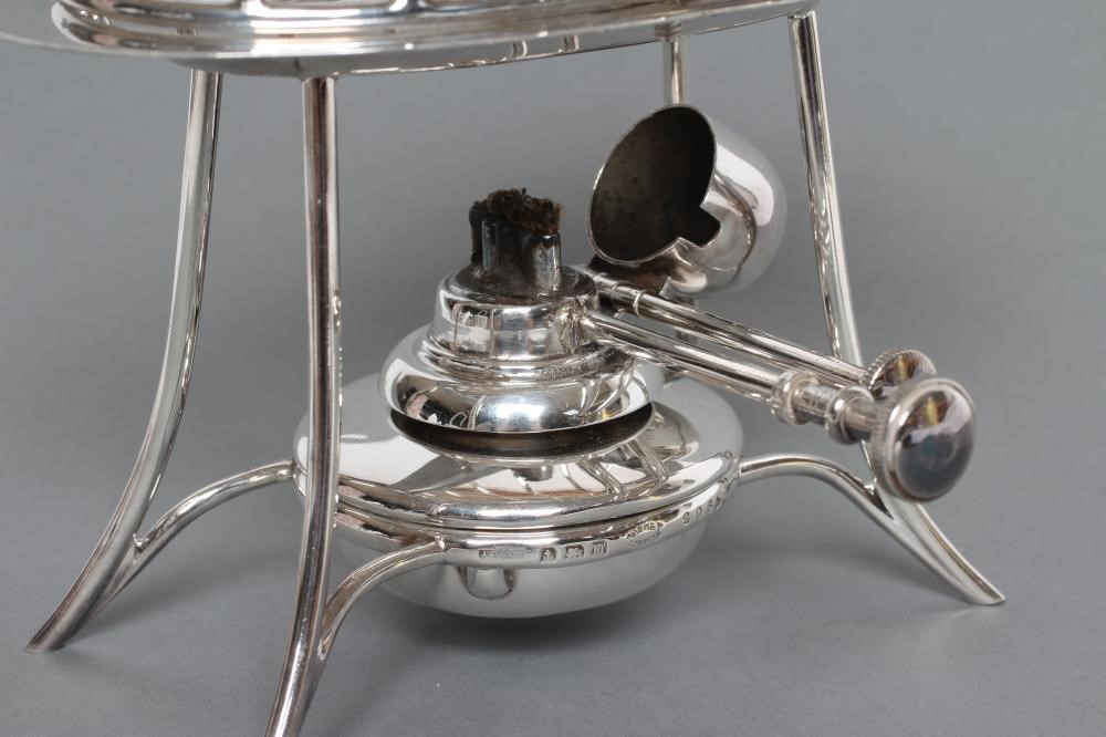 A SILVER TOASTRACK ON STAND WITH BURNER Image