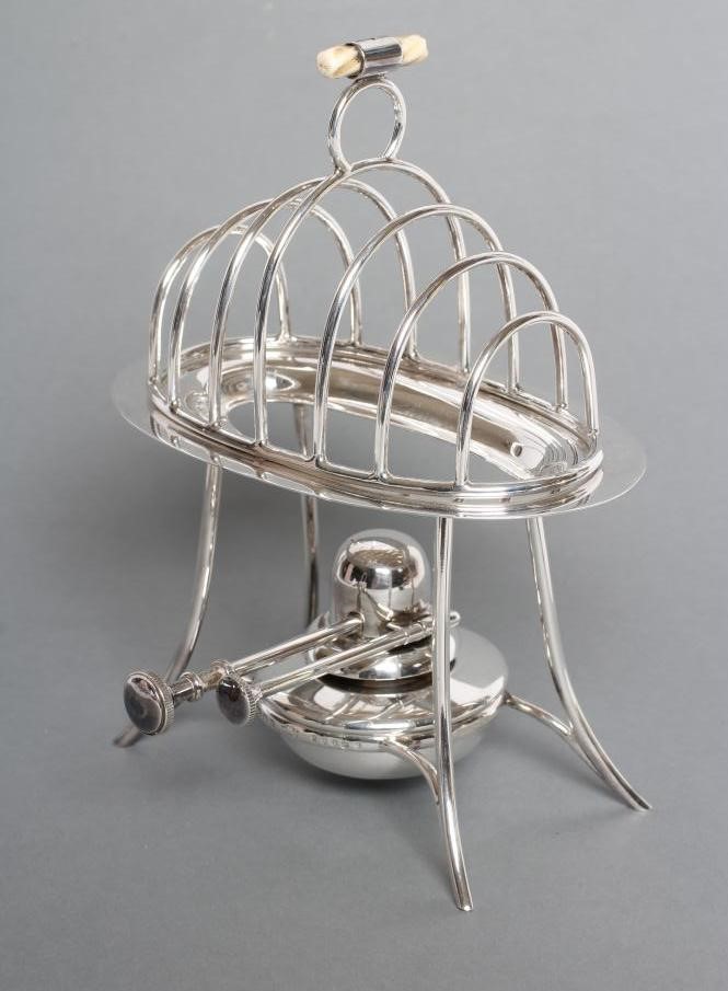 A SILVER TOASTRACK ON STAND WITH BURNER Image