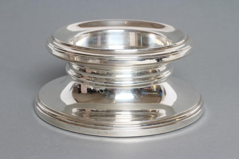 A SILVER CANDLE HOLDER Image