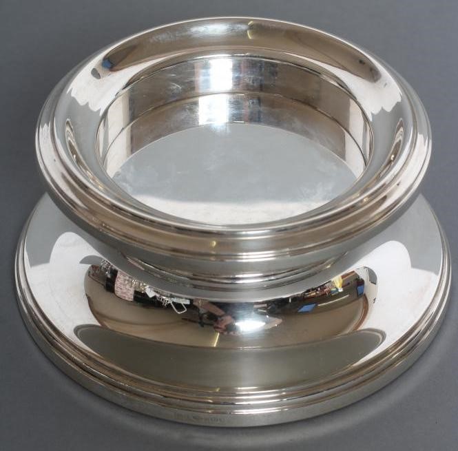 A SILVER CANDLE HOLDER Image