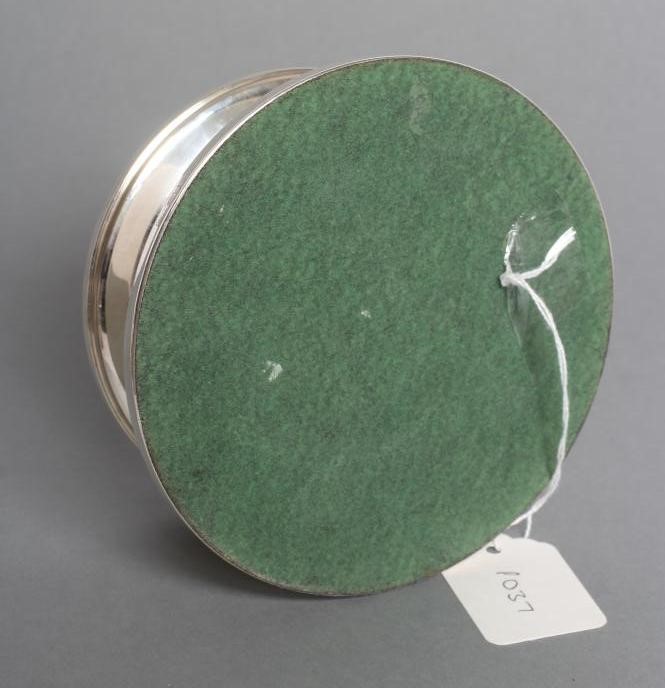 A SILVER CANDLE HOLDER Image