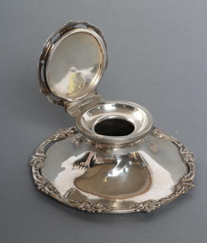 A SILVER CAPSTAN INKWELL Image