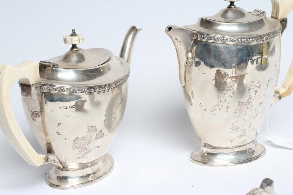 A SILVER FOUR PIECE TEA AND COFFEE SERVICE Image