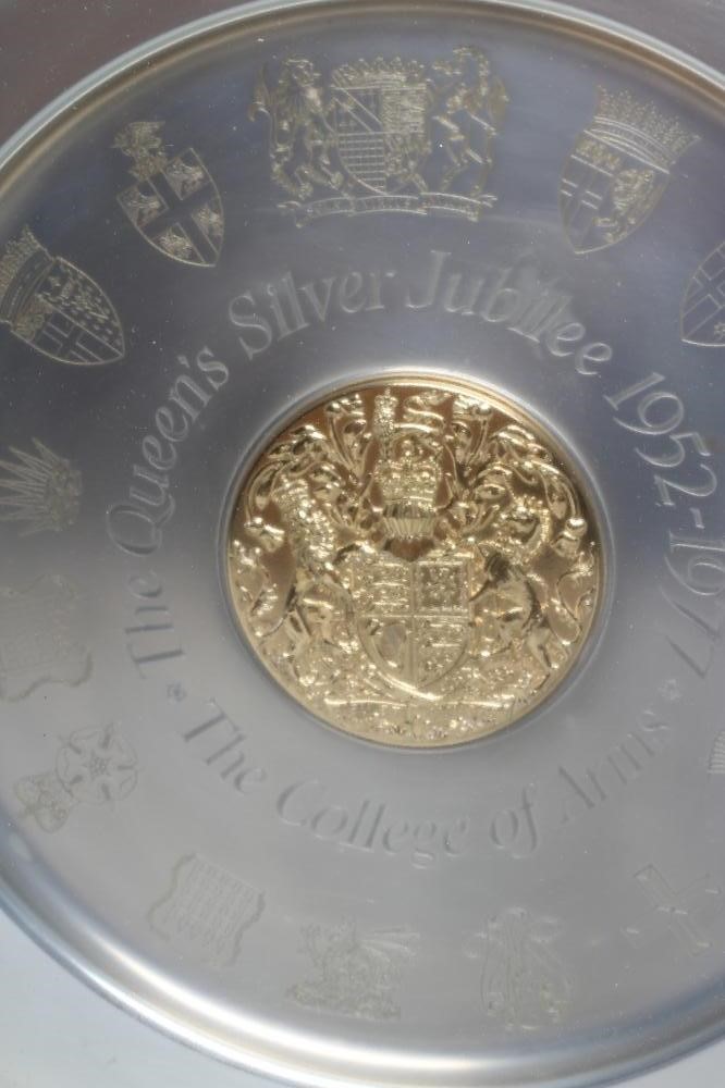 A QUEEN'S SILVER JUBILEE "COLLEGE OF ARMS" SILVER PLATE Image