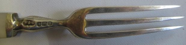 A SET OF TWELVE PAIRS OF SILVER FRUIT KNIVES AND FORKS Image