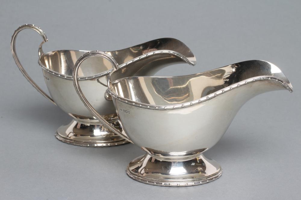 A PAIR OF SILVER SAUCEBOATS Image