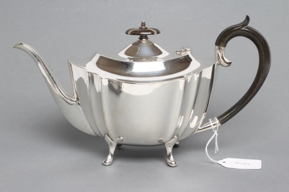 A SILVER THREE PIECE TEA SERVICE Image