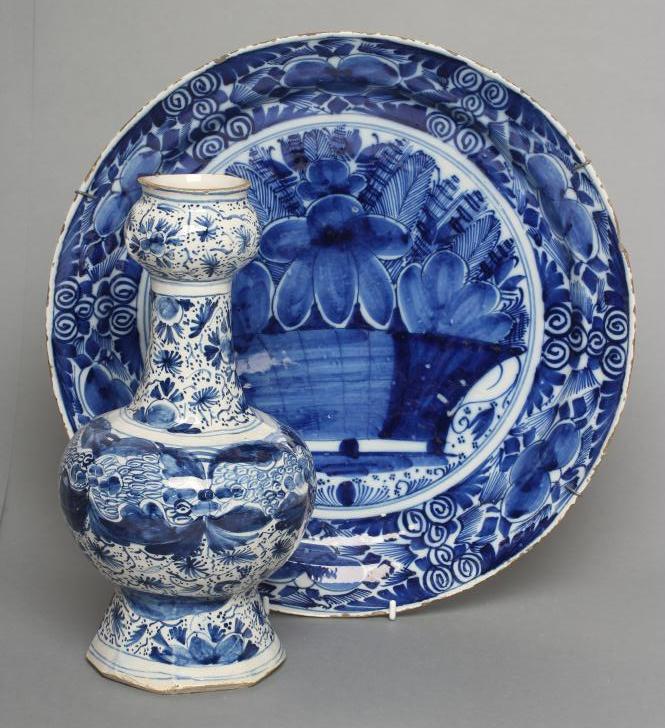 A DUTCH DELFT GARLIC NECK BOTTLE VASE of rounded octagonal form Image