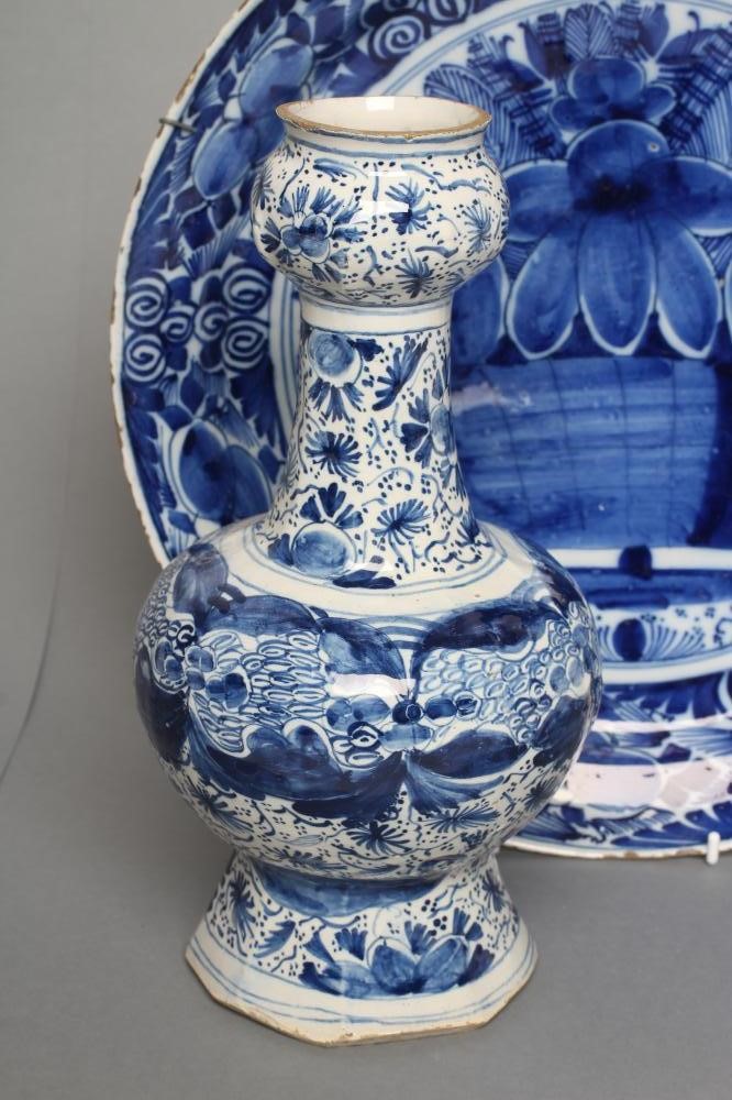A DUTCH DELFT GARLIC NECK BOTTLE VASE of rounded octagonal form Image