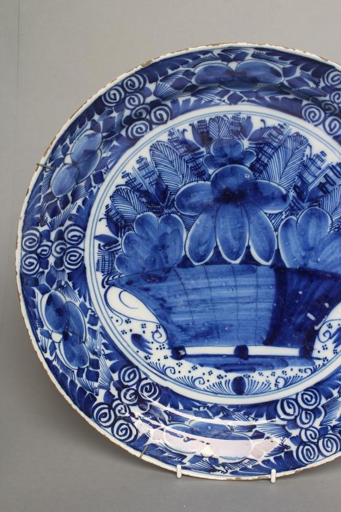 A DUTCH DELFT GARLIC NECK BOTTLE VASE of rounded octagonal form Image