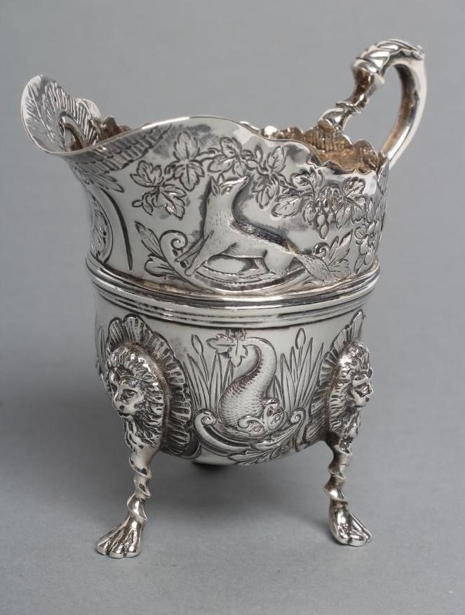 A LATE VICTORIAN SILVER CREAM JUG AND SUGAR BASIN Image