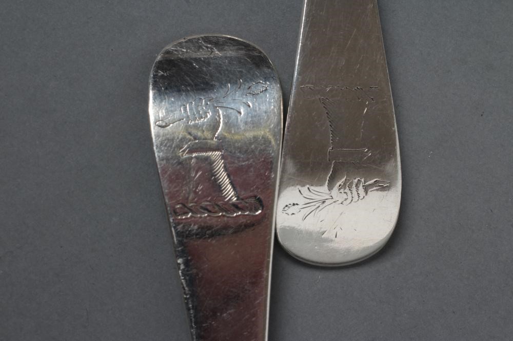 A PAIR OF GEORGE II SILVER DESSERT SPOONS Image