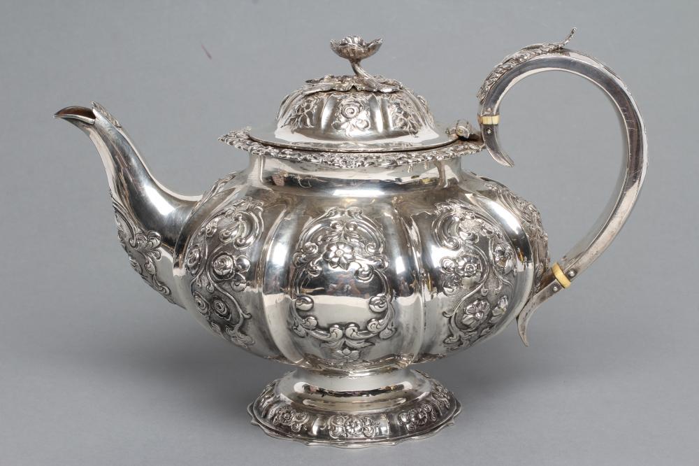 A MID VICTORIAN SILVER TEAPOT Image