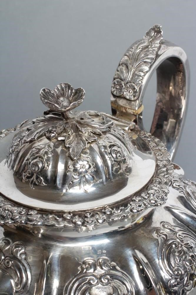A MID VICTORIAN SILVER TEAPOT Image