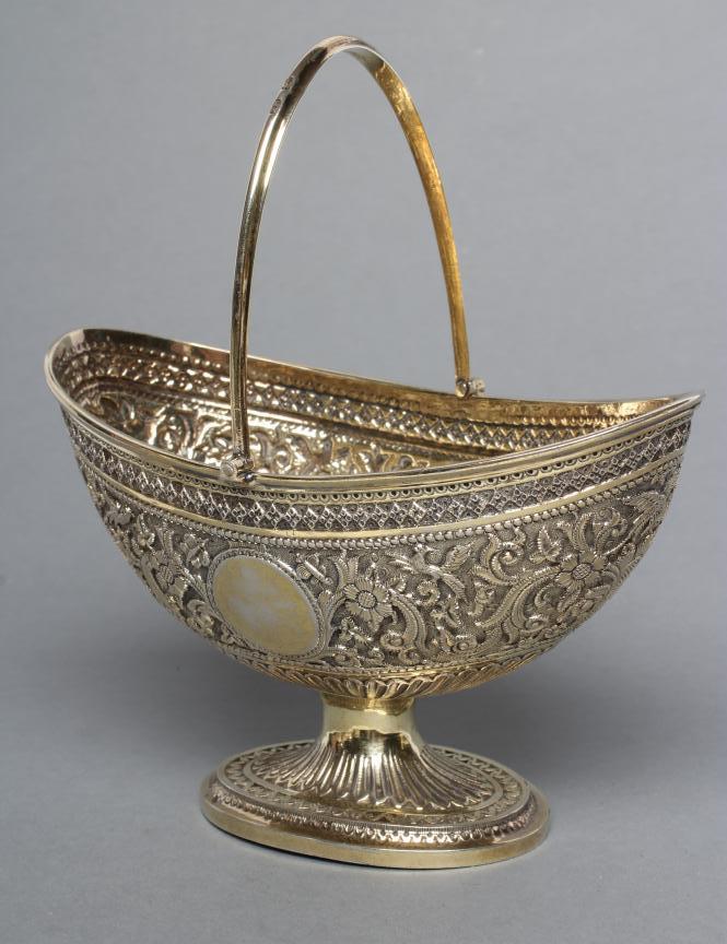 A VICTORIAN GILDED SILVER SUGAR BASKET Image
