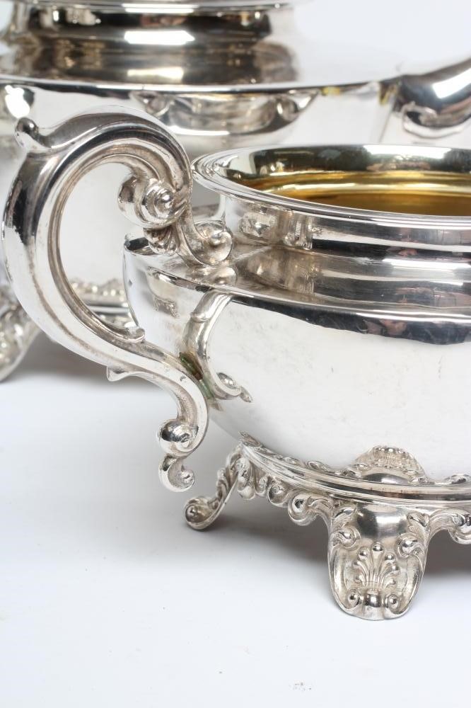 AN EARLY VICTORIAN SILVER FOUR PIECE TEA SERVICE Image