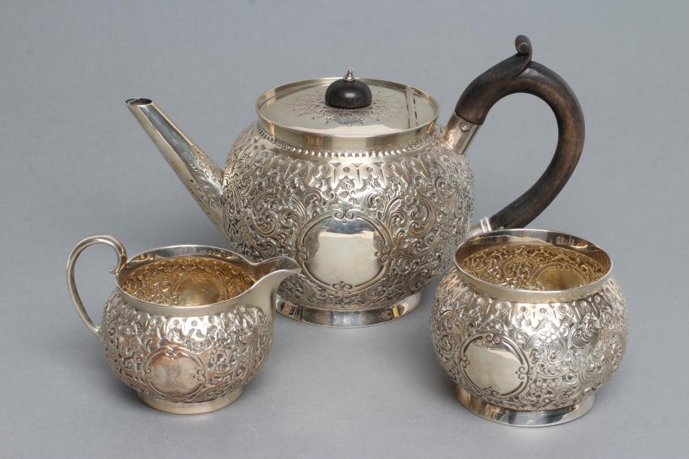 A VICTORIAN SILVER THREE PIECE TEA SERVICE Image